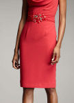 How can I accessorize a coral dress for a wedding in Southern California?
