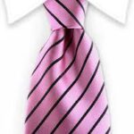 What color tie should I wear with a black suit & pink shirt?