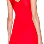How can I accessorize a sleeveless coral color dress?