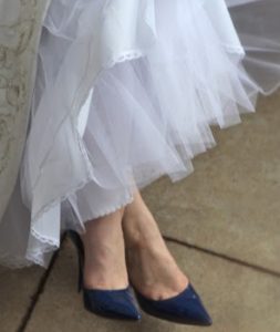 Can you wear colored shoes with a white wedding dress?