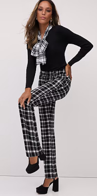 Can I wear a solid color top with black & white print pants?