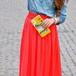 Your red maxi skirt with the dipped hem sounds très chic. Bold colors are very trendy and would be fabulous with your red skirt.