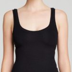 Can I wear a white blouse with a black singlet?